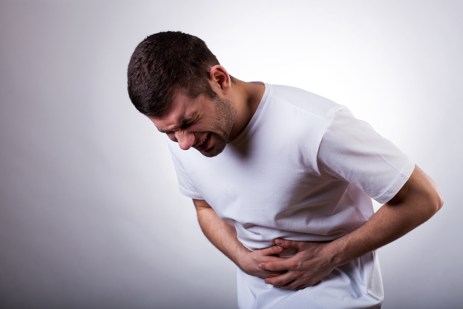 /images/post/2015/12/08/10//bigstock-Man-With-Stomachache-60360944.jpg